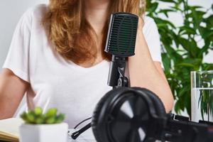 Podcast concept. Woman recording online course photo