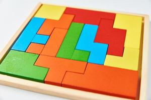 Different wooden blocks on white background photo