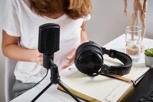 Podcast concept. Woman recording online course photo