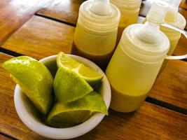 Mexican sauces spices avocado and lime Playa del Carmen Mexico. photo
