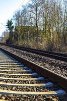 Train tracks through nature to infinity in Germany. photo