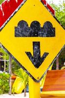 Traffic signs and road signs directional on Holbox island Mexico. photo