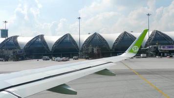 BANGKOK, THAILAND NOVEMBER 14, 2018 - Airplanes on apron of Subvarnabhumi airport, view fom taxiing aircraft video