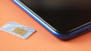 A sim card for a smart phone on table video