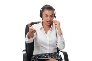 Personal assistant in the business. Hot helpline worker. Female Operator of call center with headset in white shirt photo