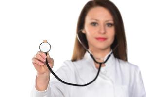 Female doctor or nurse holding stethoscope. Medical person for health insurance photo