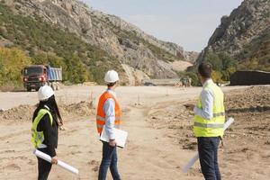 construction workers controlling explosion photo