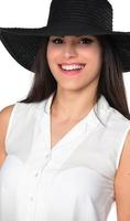 beautiful woman in a black broad-brim hat photo