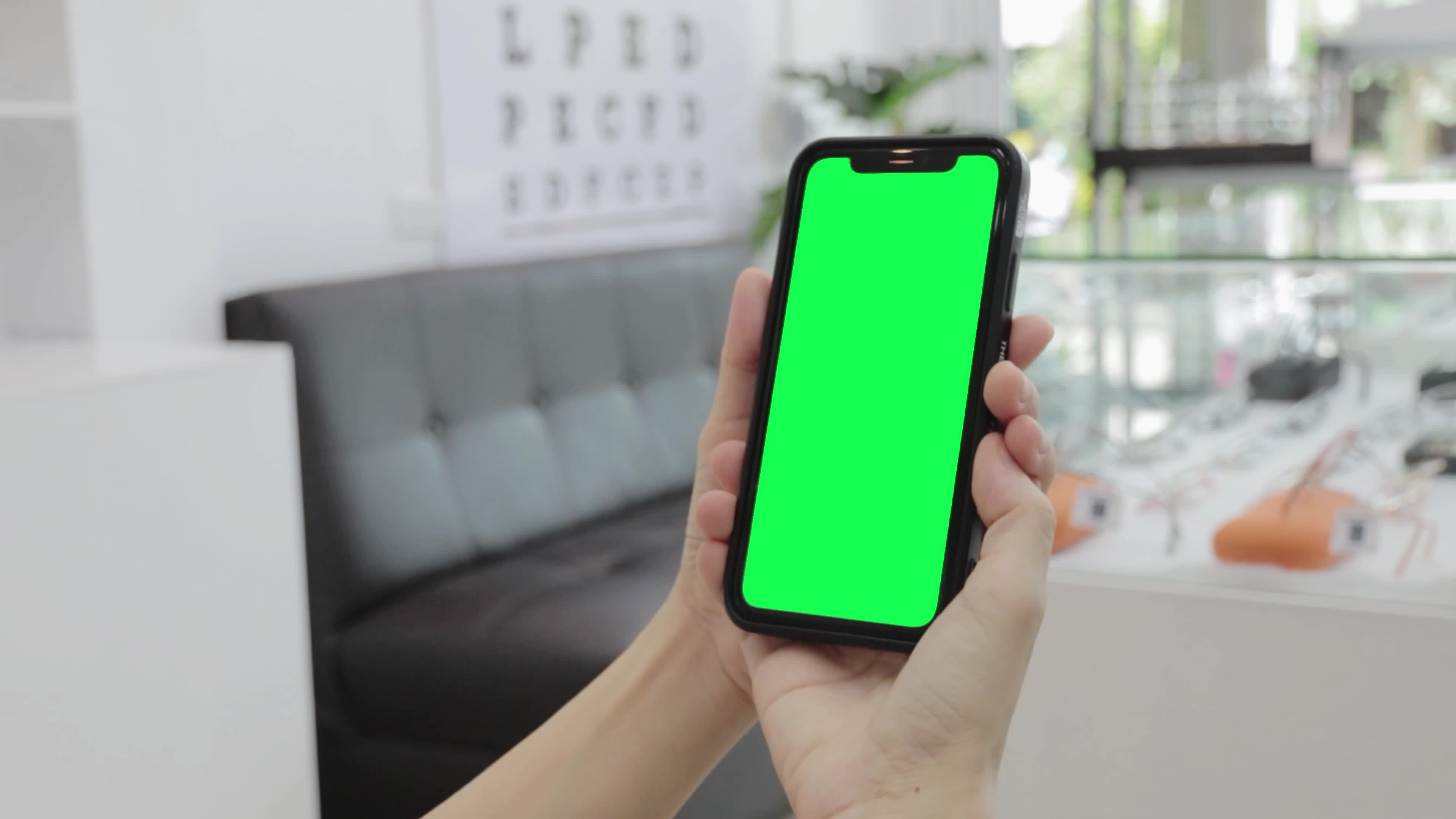 Green screen, smartphone green screen in hand, Use green screen for
