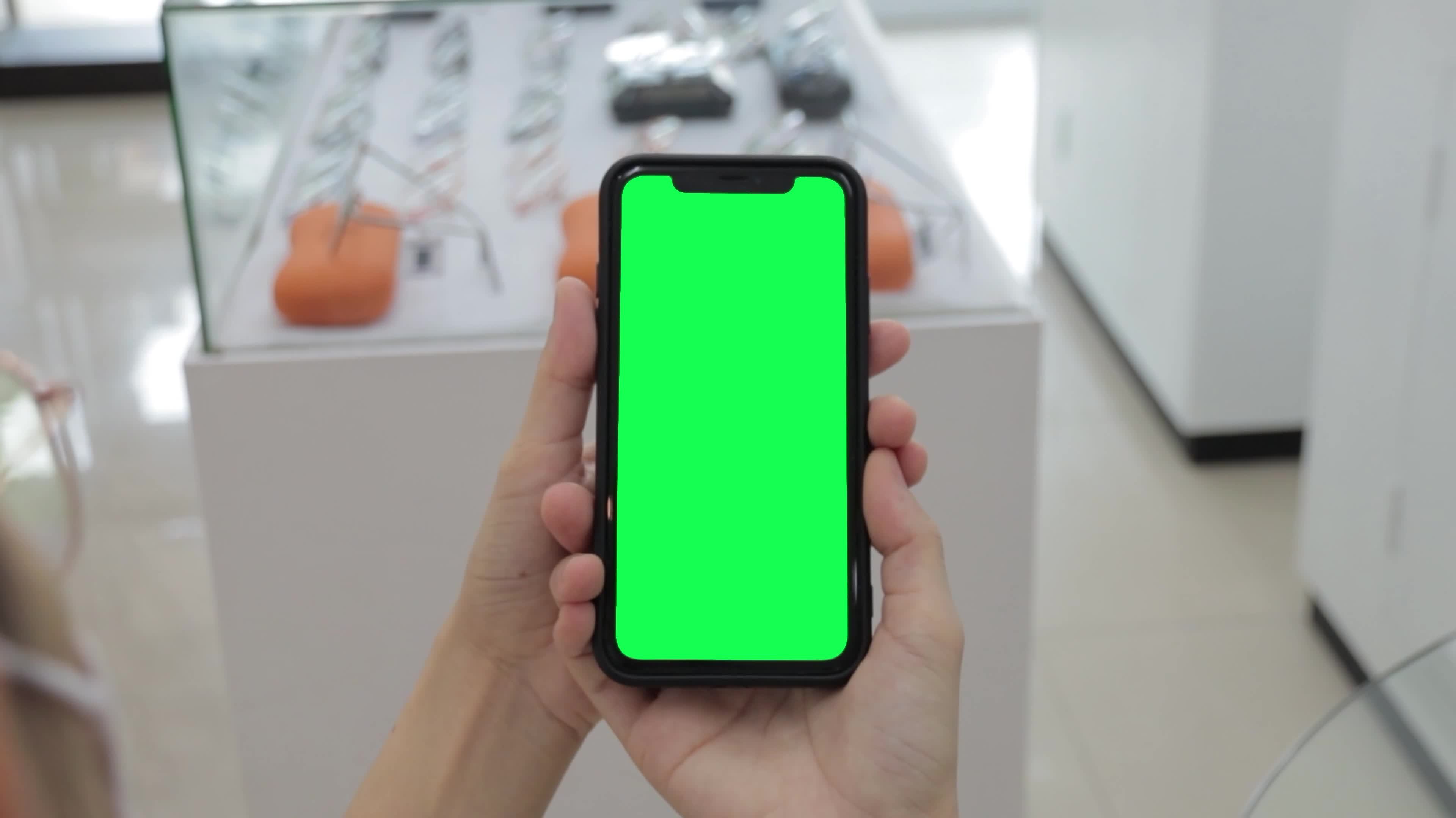 Green screen, smartphone green screen in hand, Use green screen for
