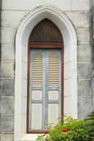 Entrance of the Gothic-style wooden and marble Christian churches is a solid and strong medieval art and is seen in many European and Christian churches around the world. photo