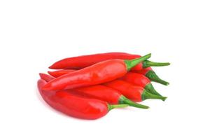 Fresh chili peppers isolated on white background. Fresh red chilies Chili peppers Paprika Mexican Spices Spicy condiments healthy organic food cooking in the kitchen photo