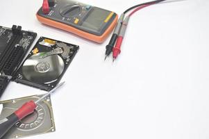 top view technician repairing hard disk photo