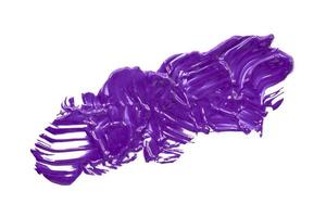 Glossy purple brush isolated on white background. photo