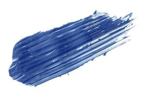 Shiny blue brush isolated on white background. photo