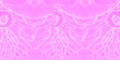 Defocus blurred transparent purple colored clear calm water surface texture with splashes and bubbles. Trendy abstract nature background. Water waves in sunlight with copy space. Pink water drop shine photo
