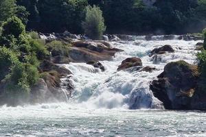 View of Rhine falls Rheinfalls.The famous rhine falls in the swiss near the city of Schaffhausen photo