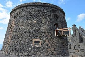 El Cotillo Toston tower castle in Fuerteventura at Canary Islands of Spain photo