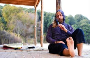 Man relaxing at beach photo