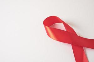 Red ribbon on a gray background, December 1 world AIDS day photo