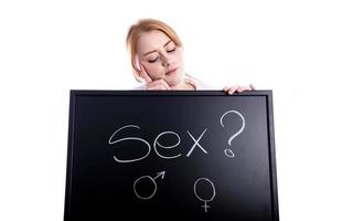 woman holding sex sign photo