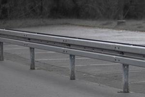 crash barrier on an old road photo