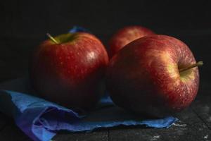 Apple Fruit on wood Background photo