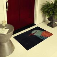 Designer Welcome Entry Doormat Placed on Floor Outside Entry Door with Plants and lemon ice drink photo
