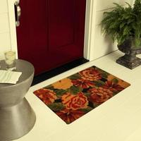 Designer Welcome Entry Doormat Placed on Floor Outside Entry Door with Plants and lemon ice drink photo