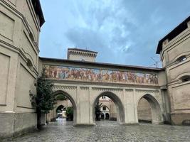 Isartor, the one of the main gates of the medieval city wall of Munich, Germany. It was constructed in 1337. The gate is located close to the Isar and was named after the river. photo