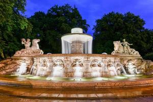 The famous Wittelsbach Fountain built in 1895, Lenbachplatz, Munich, Upper Bavaria, Germany. photo