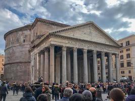 Rome, Italy - March 23, 2018 -  Pantheon during mid-day surrounded by tourists in Rome, Italy photo