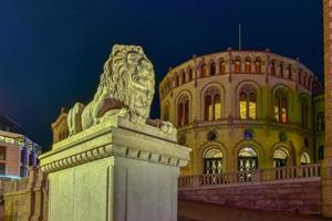 The Storting building at night. It is the seat of the Storting, the parliament of Norway, located in central Oslo. photo