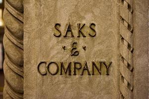 New York, New York - October 29, 2016 -  Saks and Company signage on the flagship Fifth Avenue store of high end department store Saks Fifth Avenue. The store opened in the 1920's. photo