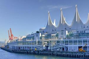 Canada Place and commercial buildings in Downtown Vancouver along Vancouver Harbour, 2022 photo