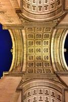 The Arc de Triomphe de l'Etoile is one of the most famous monuments in Paris, standing at the western end of the Champs-elysees at the center of Place Charles de Gaulle, 2022 photo