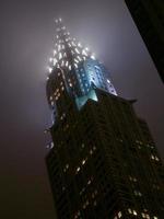 New York City skyscrapers at night on a foggy evening in Midtown Manhattan, 2022 photo