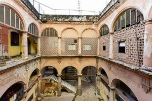 Old building in the process of collapsing in the Old Havana neighborhood of Havana, Cuba. photo