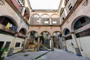 Old building in the process of collapsing in the Old Havana neighborhood of Havana, Cuba. photo