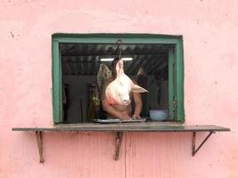Pork shop on the streets of Trinidad, Cuba, 2022 photo