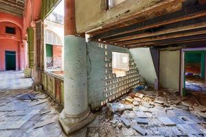 Old building in the process of collapsing in the Old Havana neighborhood of Havana, Cuba. photo