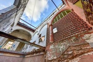 Old building in the process of collapsing in the Old Havana neighborhood of Havana, Cuba. photo