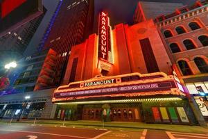 Boston, Massachusetts - Nov 27, 2020 -  The Paramount Theater, along Washington Street in Boston, Massachusetts at night. The Paramount is a performing arts facility in Boston. photo