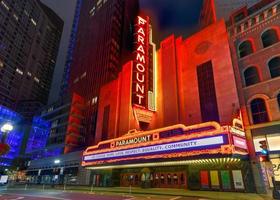 Boston, Massachusetts - Nov 27, 2020 -  The Paramount Theater, along Washington Street in Boston, Massachusetts at night. The Paramount is a performing arts facility in Boston. photo