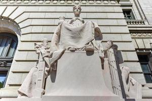 Monument in front of the Federal Building is a historic post office, courthouse and custom house on Kennedy Plaza in downtown Providence, Rhode Island, 2022 photo