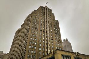 Art Deco skyscraper in midtown Manhattan, New York City on a cloudy day, 2022 photo