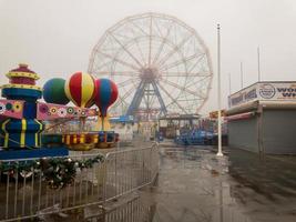 Brooklyn, New York - February 11, 2018 -  Wonder Wheel in Coney Island, Brooklyn on a foggy day. photo