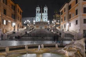 The Spanish Steps, seen at night from Piazza di Spagna in Rome, Italy. photo