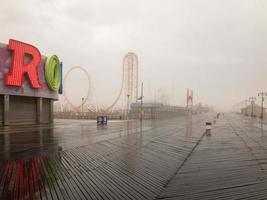 Brooklyn, New York - February 11, 2018 -  Thunderbolt Rollercoaster in Coney Island, Brooklyn on a foggy day. photo