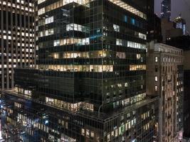 Aerial view of Midtown offices in Manhattan, New York City at night. photo